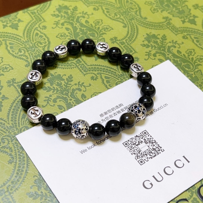 G*u*i bracelets